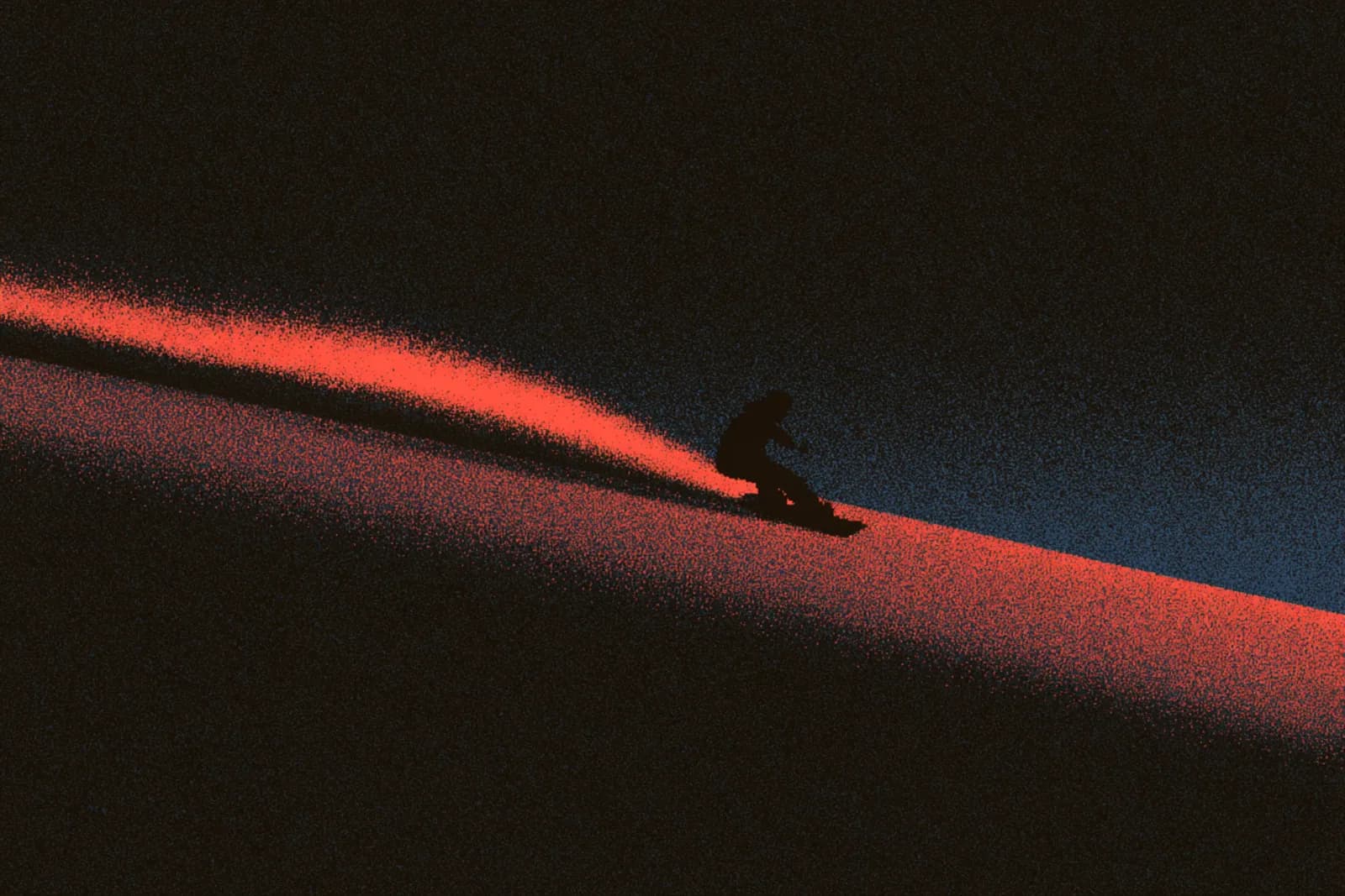 A snowboarder carving a groomer at last light