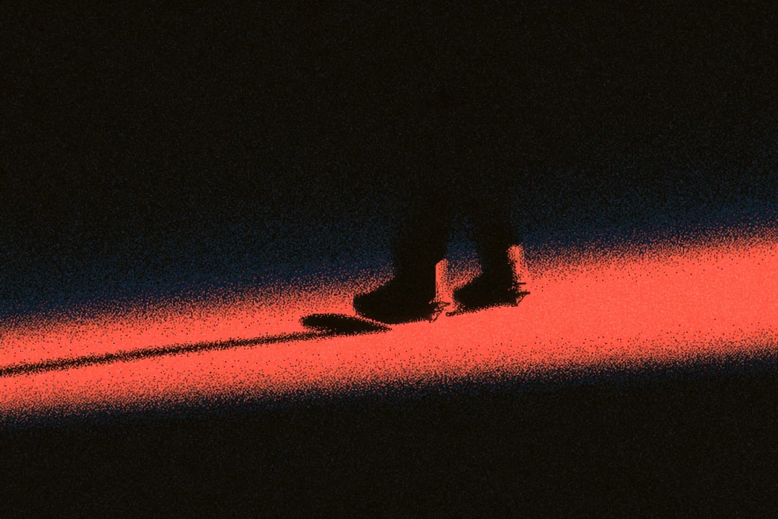 Snowboard boots strapped into bindings, backlit on snow