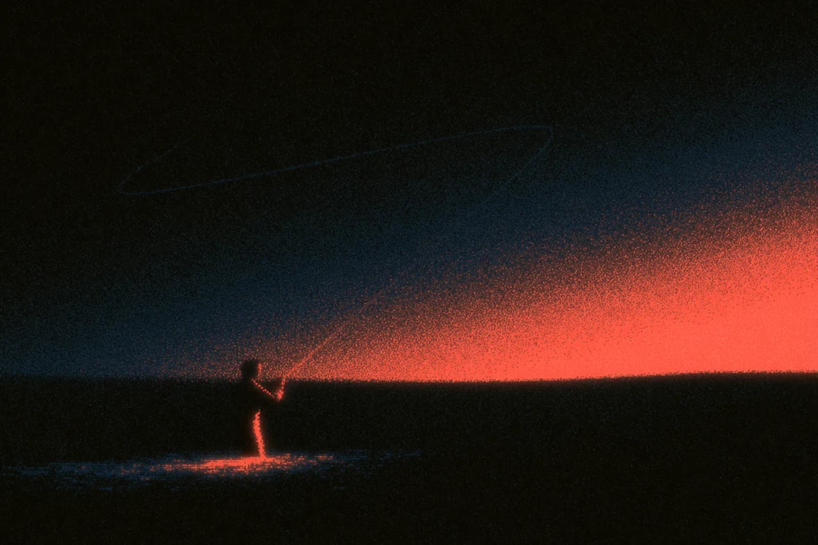 A fly angler casting on a river at dusk